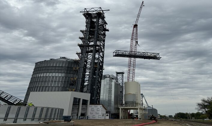 Crane lifting grain elevator parts